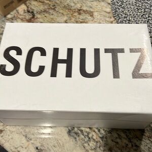 Schultz multi colored ankle tie pump. Size 8.5 B clear front sides